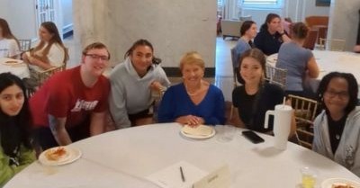 President Hays with Undergraduate Students at Pizza Dinner 